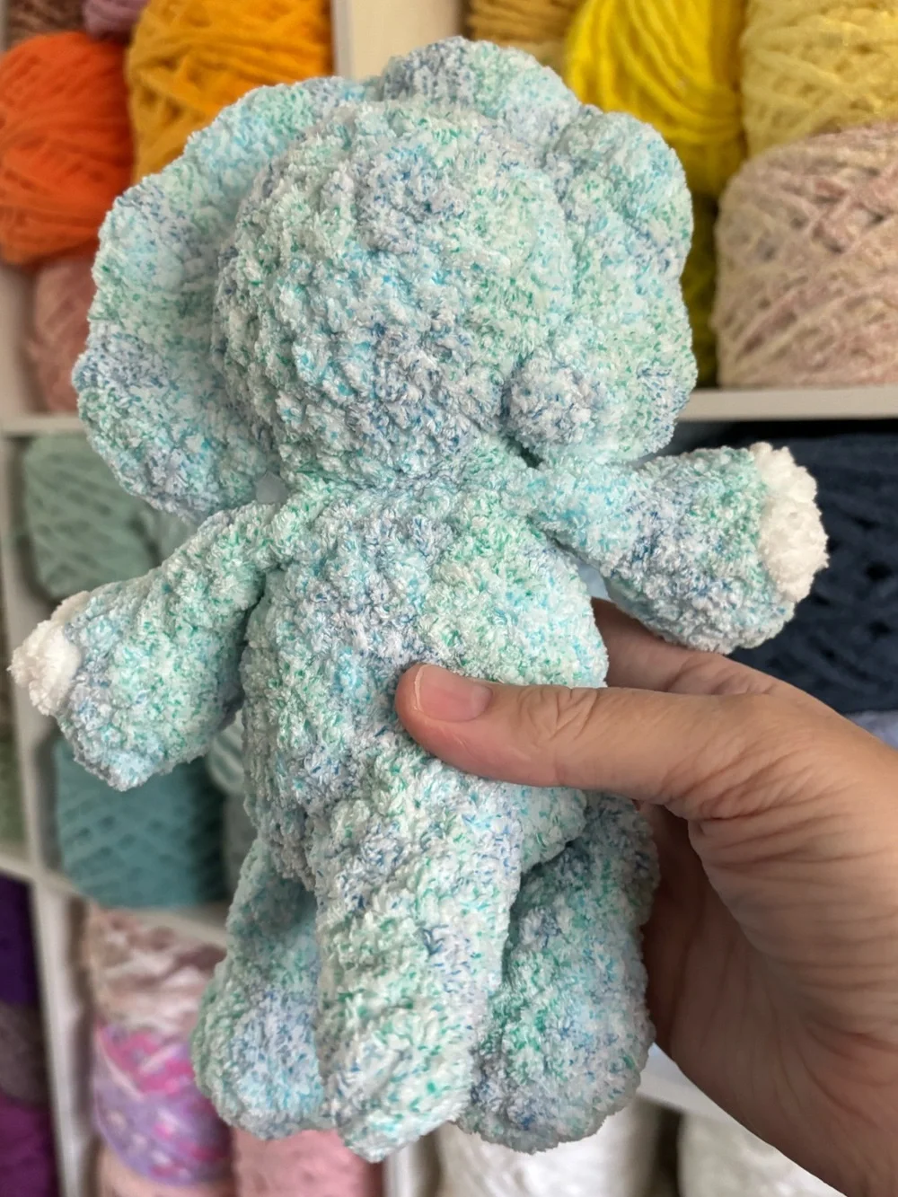 Crochet baby Triceratops plush.